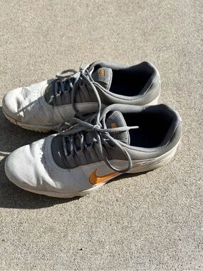 Nike Gray Sneakers with Orange Swoosh